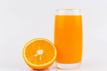 Orange juice and slices of orange on white background