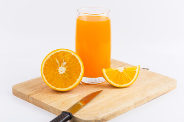 Orange juice and slices of orange on white background