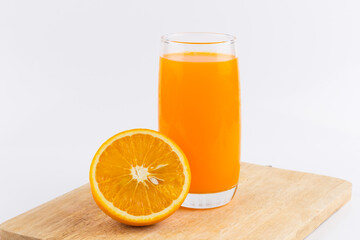 Orange juice and slices of orange on white background
