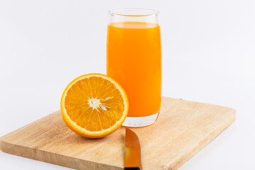 Orange juice and slices of orange on white background