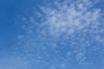 Fantastic soft white clouds against blue sky
