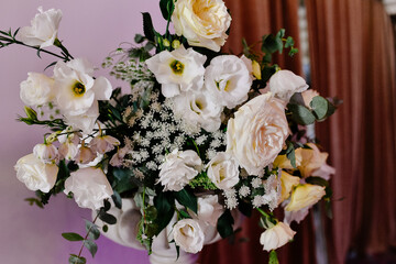 Beautiful flower arrangement of roses in a vase