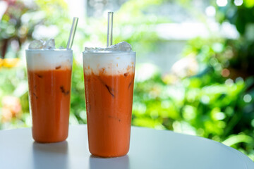 glass of Thai iced tea with milk