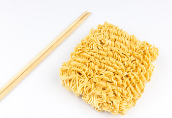 A block of uncooked Ramen Noodles on white background.