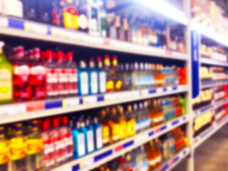 Abstract blurred supermarket store and refrigerators in department store. Interior shopping mall defocused background. Business food. Bokeh light background. Blur supermarket. Drink zone concept