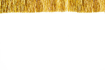 Golden christmas tinsel with empty space for your text. Copy space