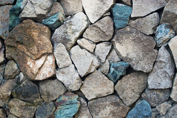 Background laying natural rock stone.