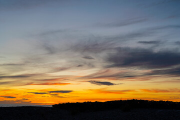 Fototapeta na wymiar Coastal landscape during an summer sunset at Blasé on the island of Gotland in Sweden