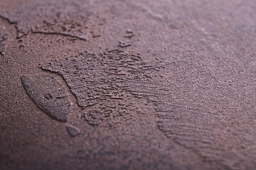 warm brown wall background in the bedroom with a building plaster surface