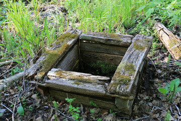 old lost wooden well