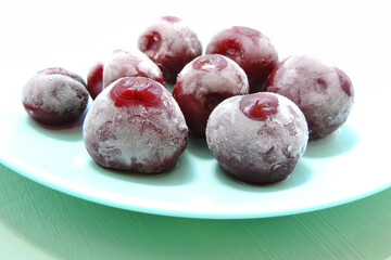      frozen berry cherries covered with hoarfrost