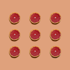 Grapefruit pattern on pastel background. Fresh fruit. Grapefruit isolated on pastel background.