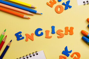 Word english made of colored letters. Learning a new language concept