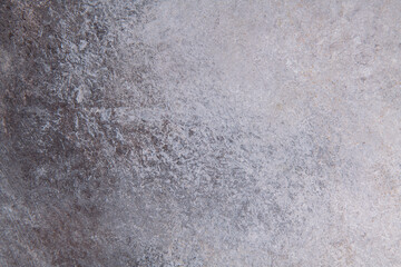 Fototapeta premium gray-brown smooth background from construction plaster on a wooden base