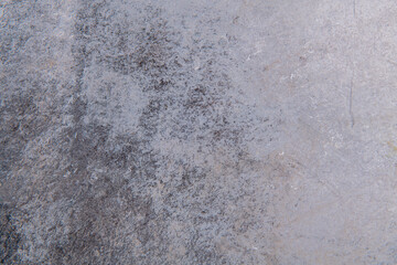 gray-brown smooth background from construction plaster on a wooden base