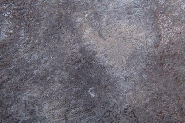 gray-brown smooth background from construction plaster on a wooden base
