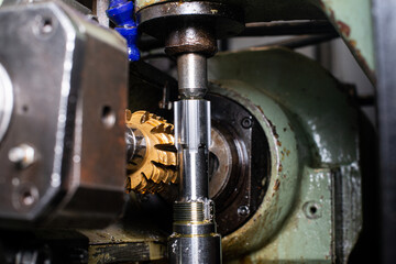 gear cutting machine close up. production of metal parts.