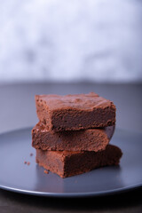 Brownie cake. Homemade Chocolate Dessert. A popular dark chocolate cake. Close-up, place for text.