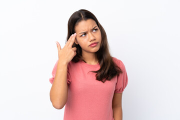 Fototapeta premium Young Colombian girl over isolated white background with problems making suicide gesture