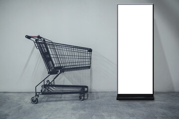 Blank billboard with shopping card in a supermarket