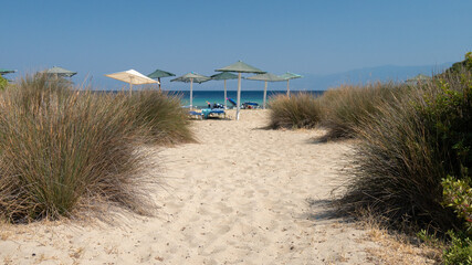 Caribbean Beach.Paradise. Vacation and Tourism concept. Sunbeds and blue sea