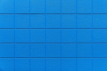 Cement block wall Painted blue sea texture and seamless background