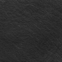 Black concrete stone texture for background in black.  Cement and sand grey dark detail covering.