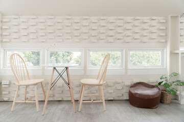 Set Of White Wooden Vintage Chairs in white decorative tones.