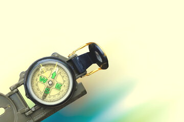 round compass on abstract background as symbol of tourism with compass, travel with compass and outdoor activities with compass