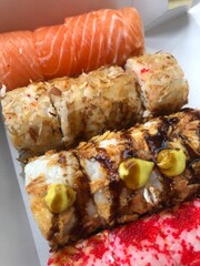 Delicious sushi with fish caviar and eel