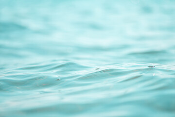 Close up of sea wave, low angle view. Selective focus, bokeh