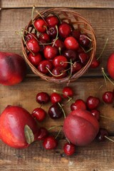 Juicy nectarines and cherries on the table
