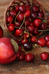 Juicy nectarines and cherries on the table