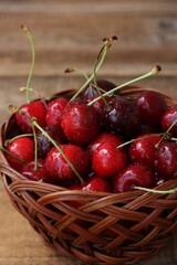 Ripe red cherries on a wooden table