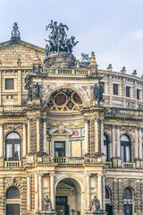 Obraz premium Architectural fragments of Opera House (The Semperoper) - the Saxon State Opera Dresden, Germany. Building (1841) located near the Elbe River in the historic centre of Dresden