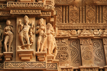 Close up of artful carved walls, Ancient reliefs at famous erotic temple in Khajuraho, Madhya...