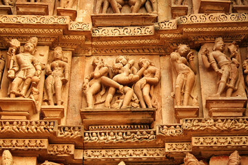 Close up of artful carved walls, Ancient reliefs at famous erotic temple in Khajuraho, Madhya...