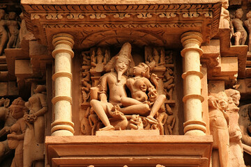 Close up of artful carved walls, Ancient reliefs at famous erotic temple in Khajuraho, Madhya...