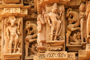 Close up of artful carved walls, Ancient reliefs at famous erotic temple in Khajuraho, Madhya...
