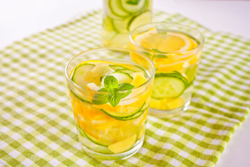 Lemonade or mojito cocktail with lemon and mint, cold refreshing drink or beverage