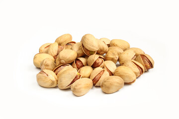 Group of raw and delicious pistachios in shell isolated on white background.