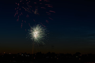 fireworks bursting in the night sky