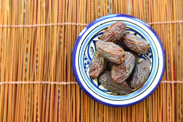Arabic dates in a Moroccan bowl - bird eye view