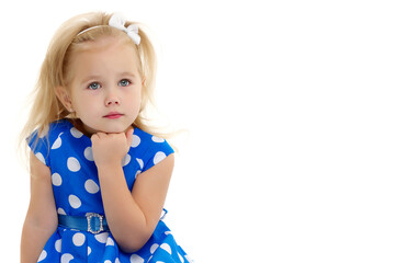 The little girl thinks.Isolated on white background.