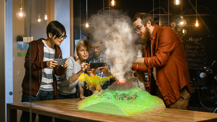 Group of Young Developers Look at Dinosaur and Volcano Eruption in Augmented Reality Through...