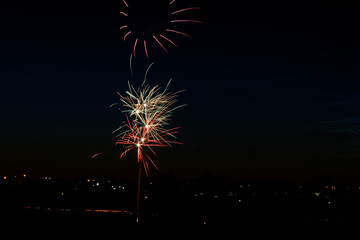 fireworks exploding over the city