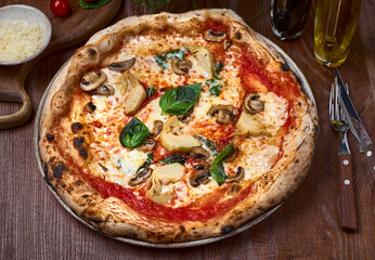 Delicious pizza with artichokes and parmigiano cheese flakes