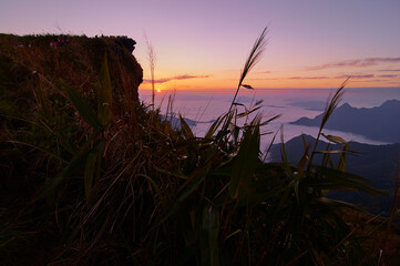 Beautiful mountains landscape. Sunrise on Phu Chi Fa, North Thailand.