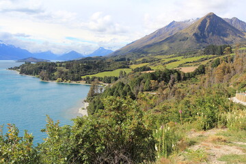 Georgeous landscapes, lush green meadows, moutains and clear blue waters near Glenorchy, New Zealand