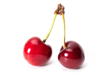 Two cherry berries isolated on white background